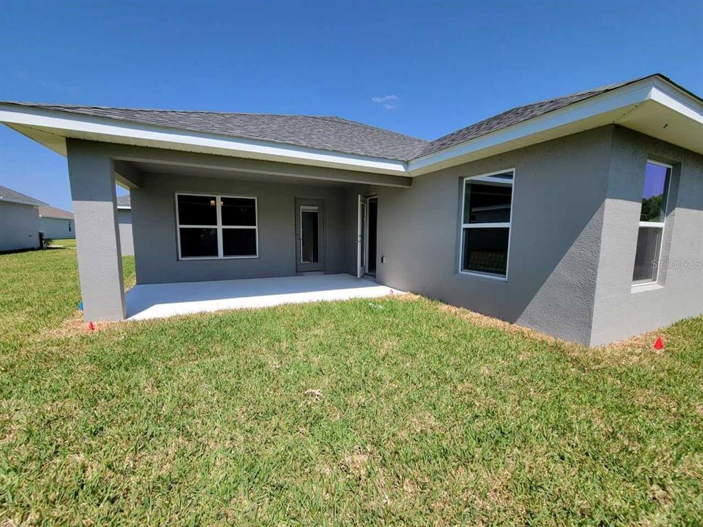 4525 Southwest 91st Ln Road Ocala, FL 34476 - Photo 20 of 20 a house view with a garden space