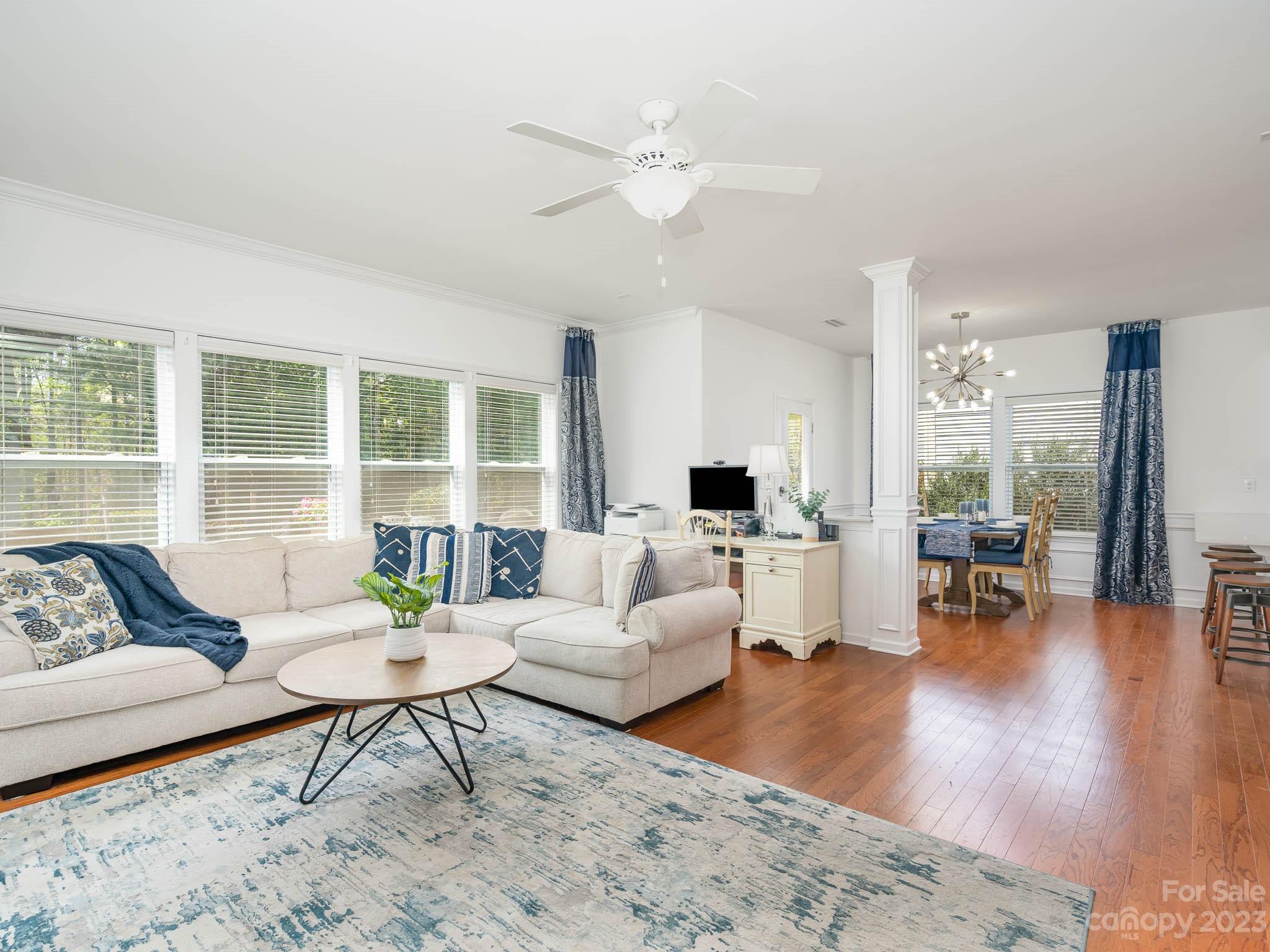 2185 Bluebell Way Tega Cay, SC 29708 - Photo 17 of 45 a living room with furniture and view of kitchen