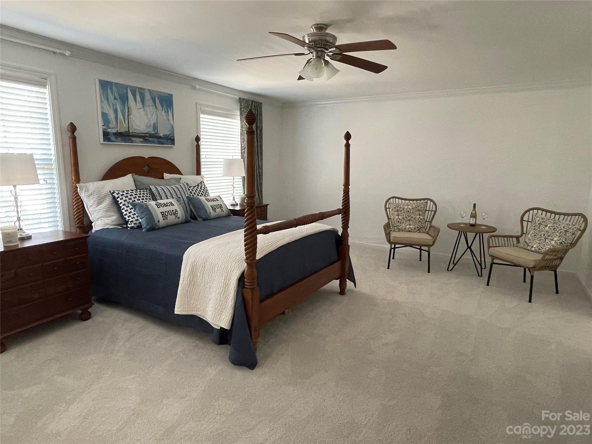 2185 Bluebell Way Tega Cay, SC 29708 - Photo 22 of 45 a bedroom with furniture and a window