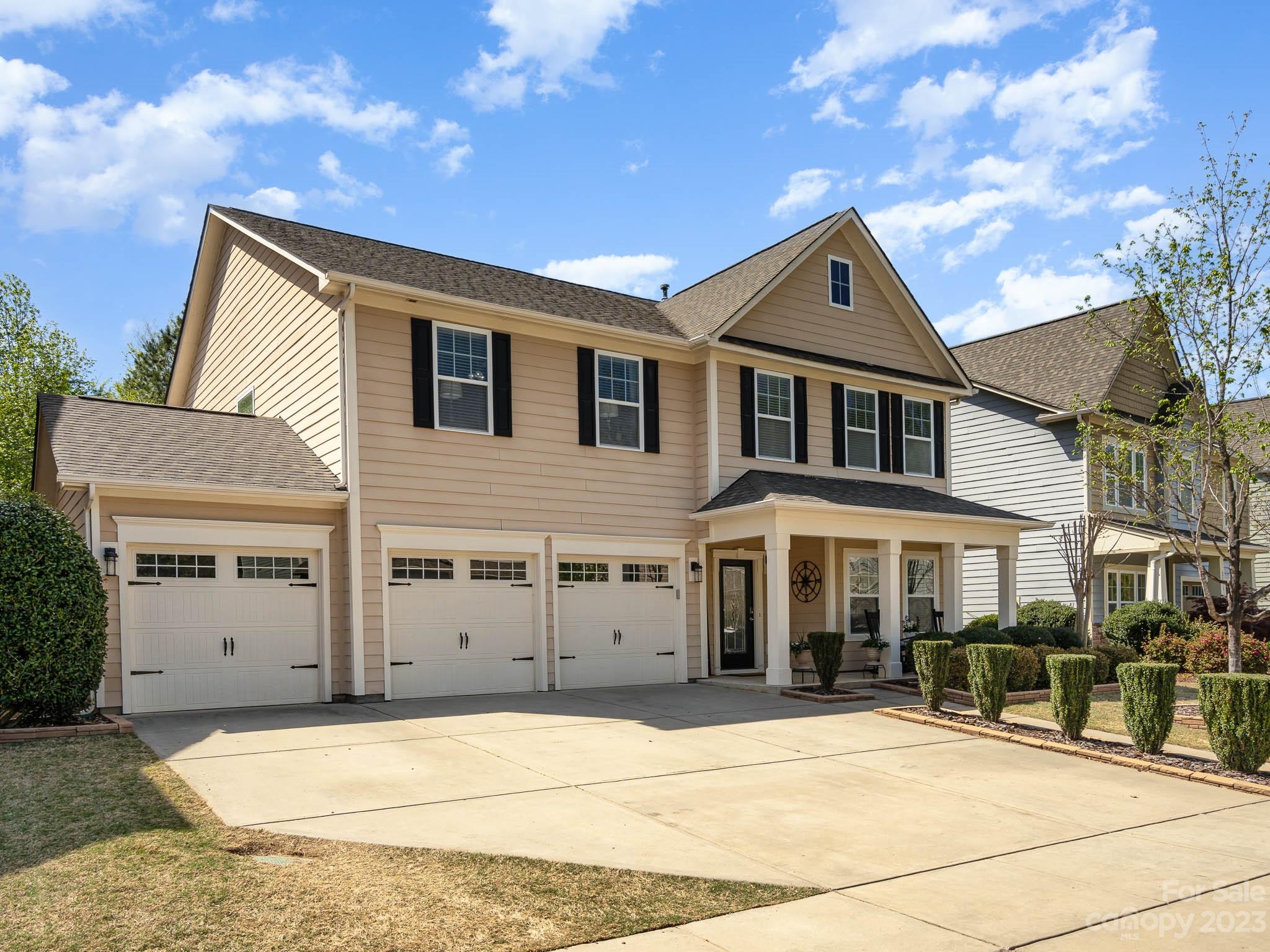 2185 Bluebell Way Tega Cay, SC 29708 - Photo 3 of 45 a front view of a house with windows