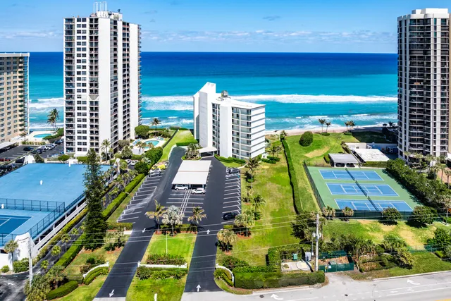 a view of a swimming pool with a lounge chairs