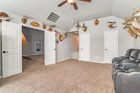 a living room with a flat screen tv