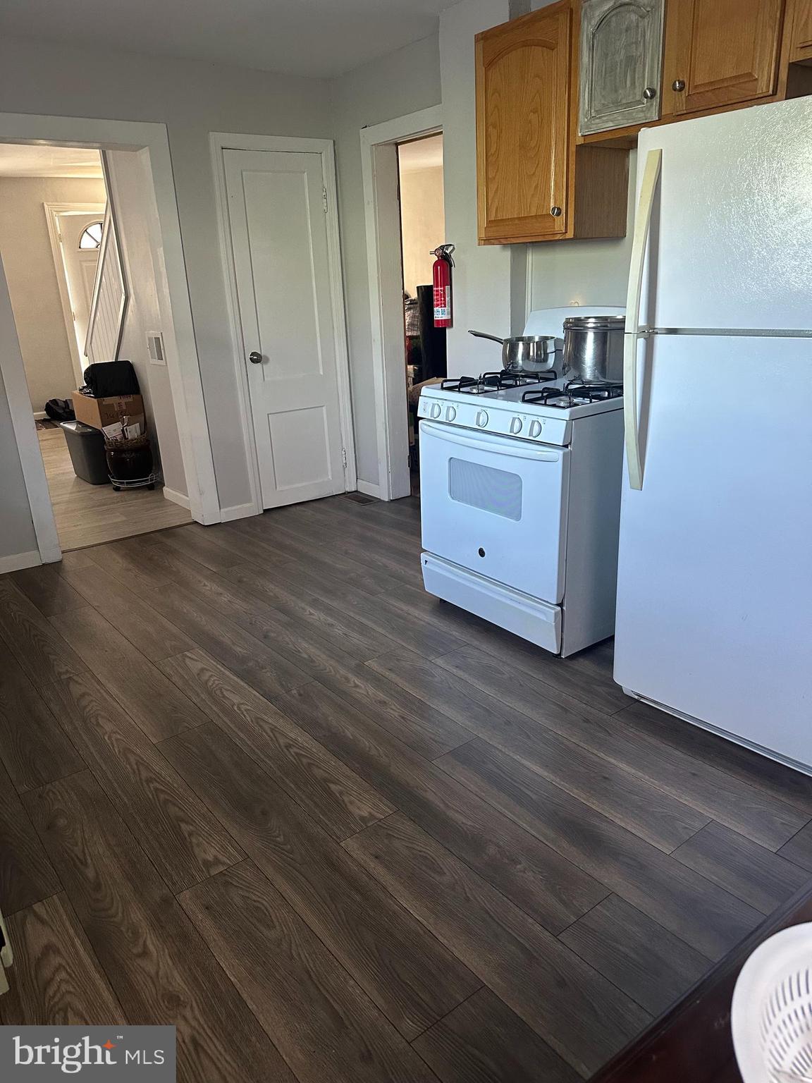 341 Stokes Avenue Ewing, NJ 08638 - Photo 6 of 13 a kitchen with stainless steel appliances granite countertop a stove and a refrigerator