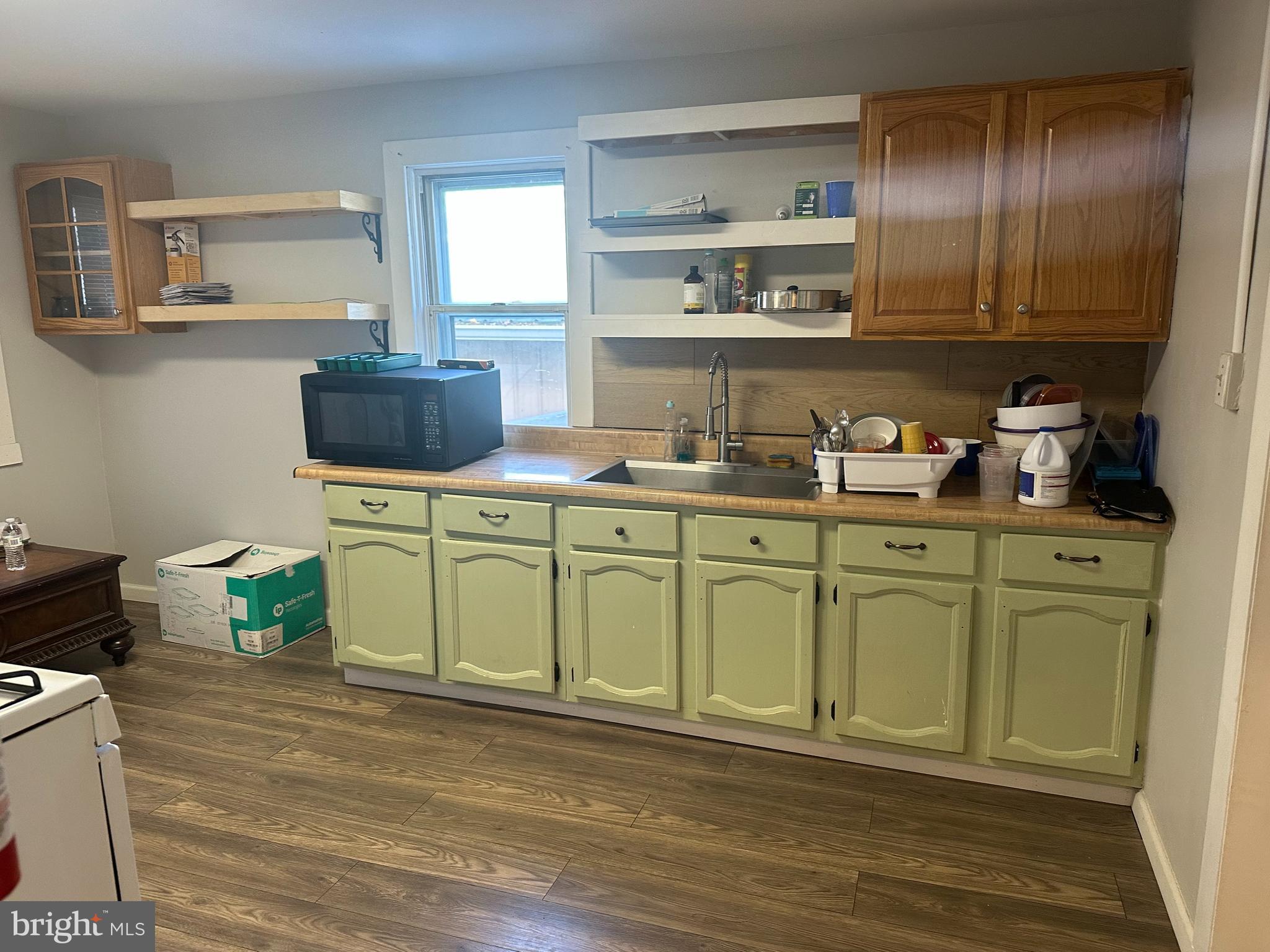 341 Stokes Avenue Ewing, NJ 08638 - Photo 7 of 13 a kitchen with cabinets a sink and appliances