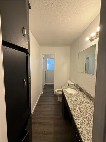 a view of bathroom with dual sinks
