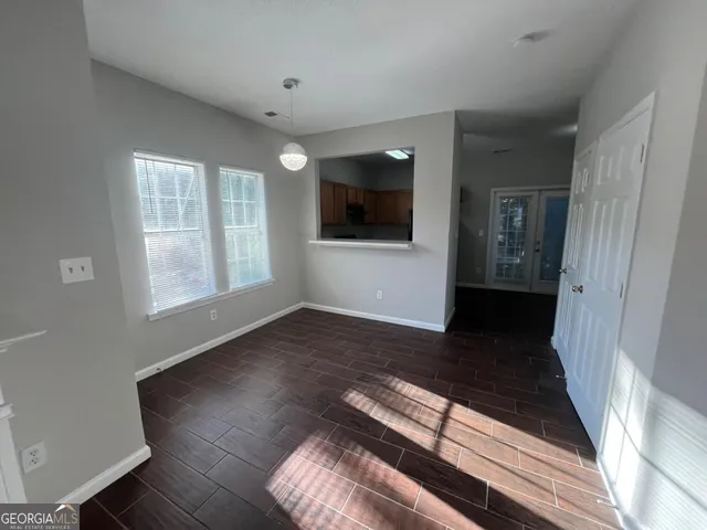 a view of a living room with a flat screen tv