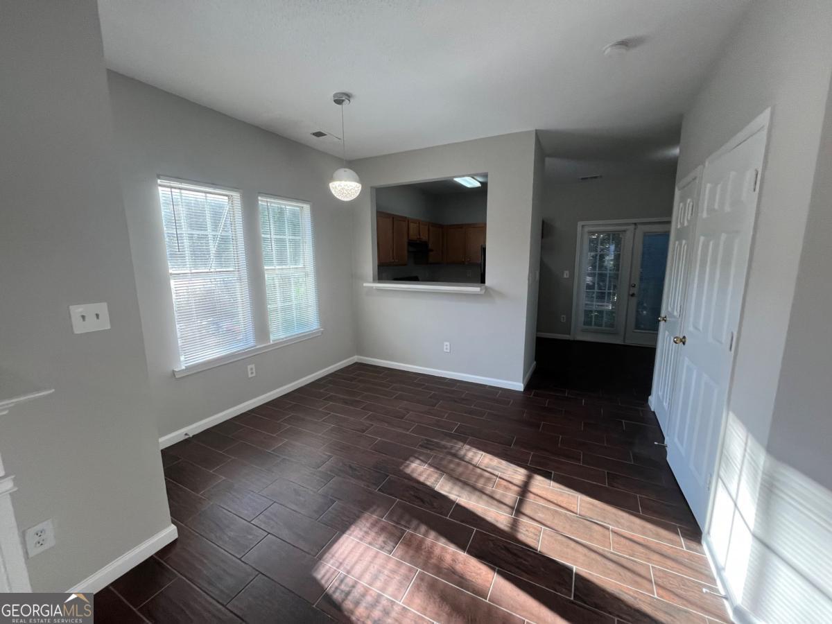 3604 Ginnis Road, Unit 1 Atlanta, GA 30331 - Photo 3 of 15 a view of a living room with a flat screen tv