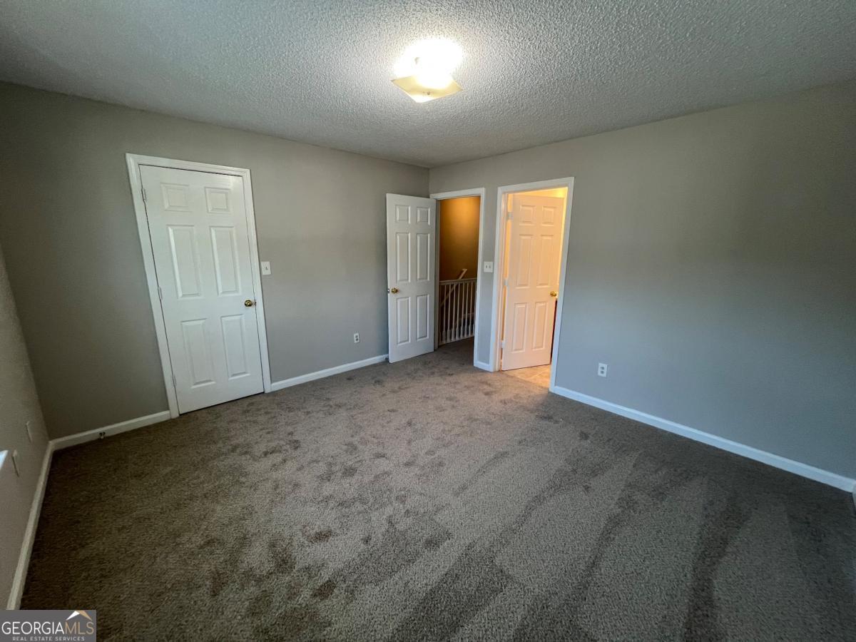 3604 Ginnis Road, Unit 1 Atlanta, GA 30331 - Photo 10 of 15 a view of an empty room and a window