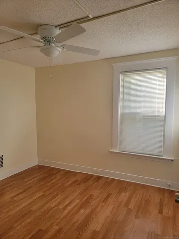 a view of a room that has a window in it
