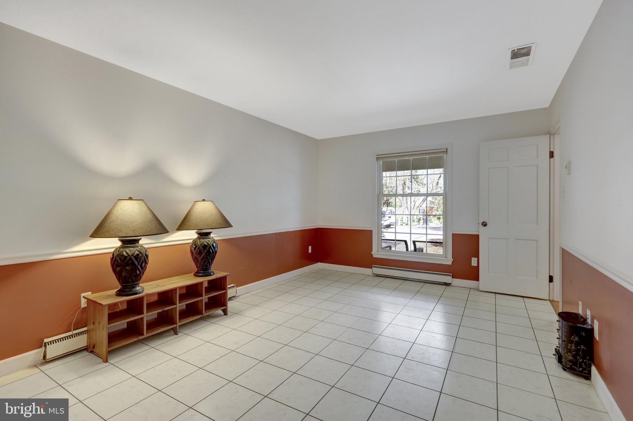 11332 Vale Road Oakton, VA 22124 - Photo 12 of 52 a view of livingroom with furniture and window