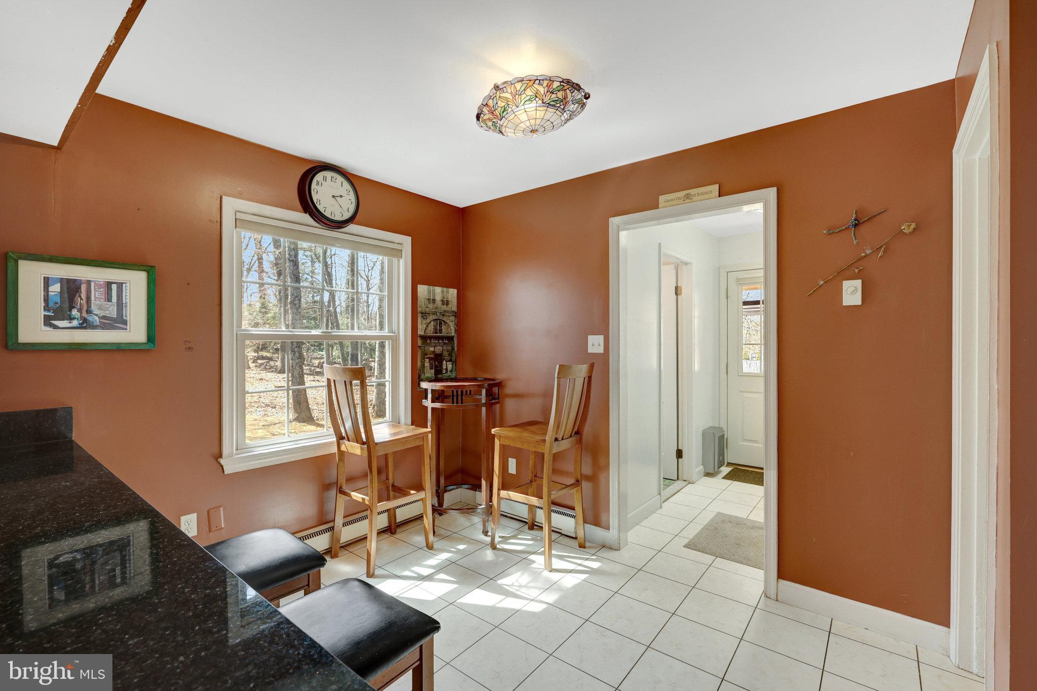 11332 Vale Road Oakton, VA 22124 - Photo 24 of 52 a view of a livingroom with workspace and a window