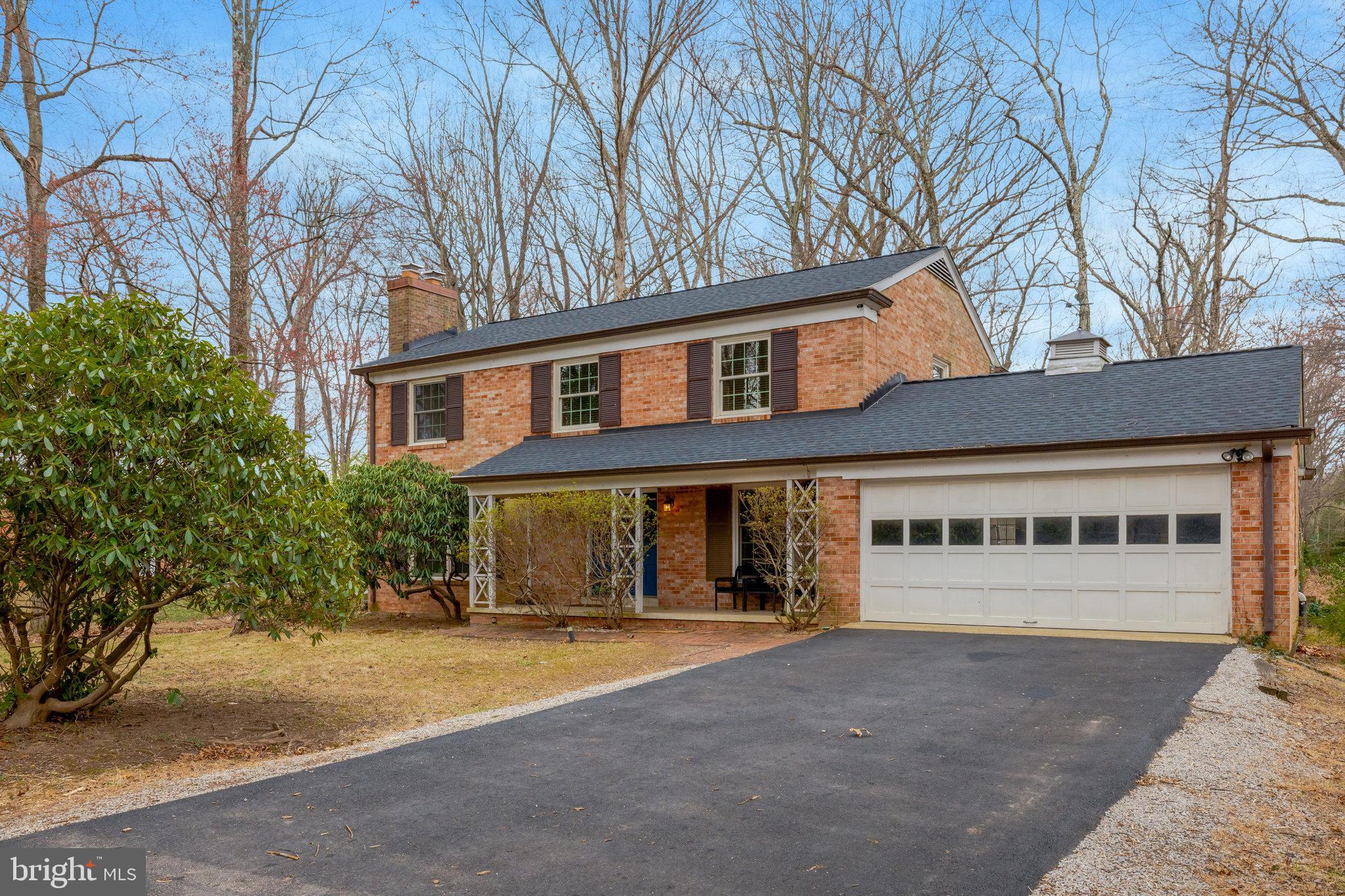 11332 Vale Road Oakton, VA 22124 - Photo 3 of 52 front view of a building with a yard