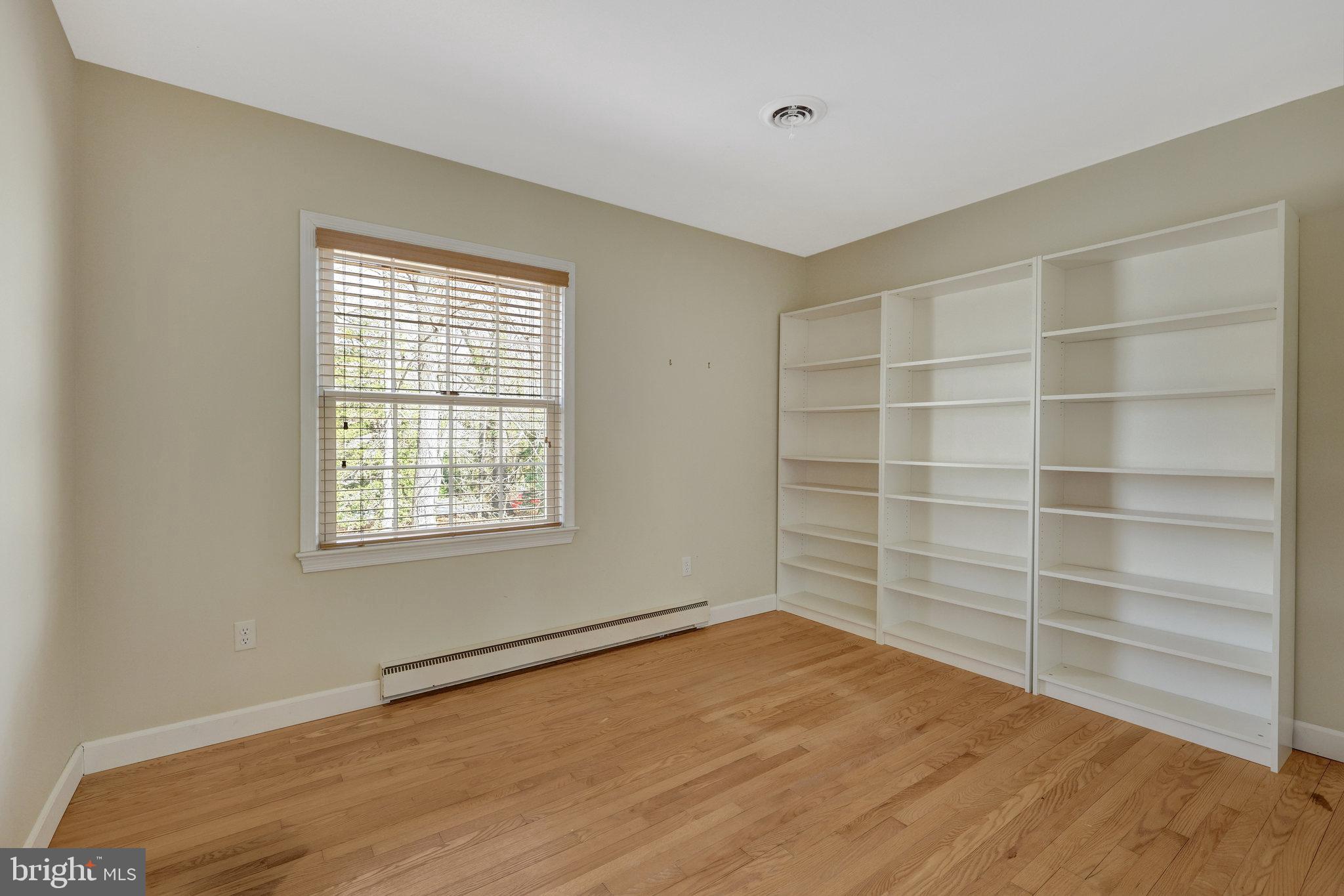 11332 Vale Road Oakton, VA 22124 - Photo 32 of 52 a view of an empty room with a window