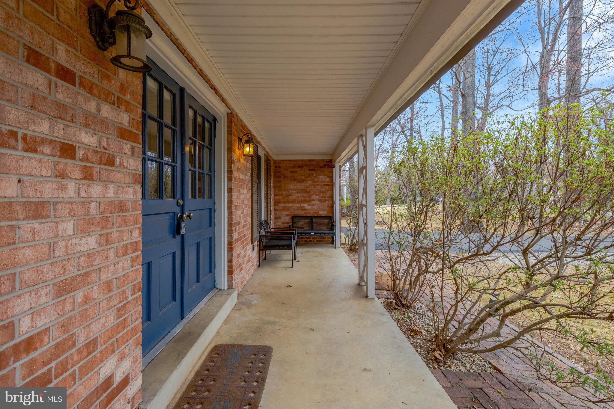 11332 Vale Road Oakton, VA 22124 - Photo 5 of 52 a view of a pathway both side of building
