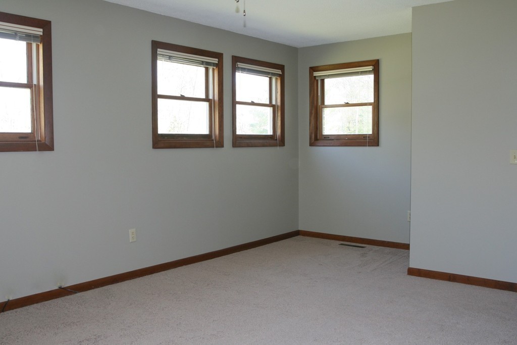 100 Signal Hill Circle Springfield, MA 01118 - Photo 11 of 19 an empty room with a window