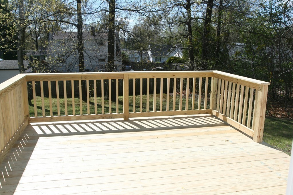 100 Signal Hill Circle Springfield, MA 01118 - Photo 17 of 19 a view of balcony with wooden floor and fence