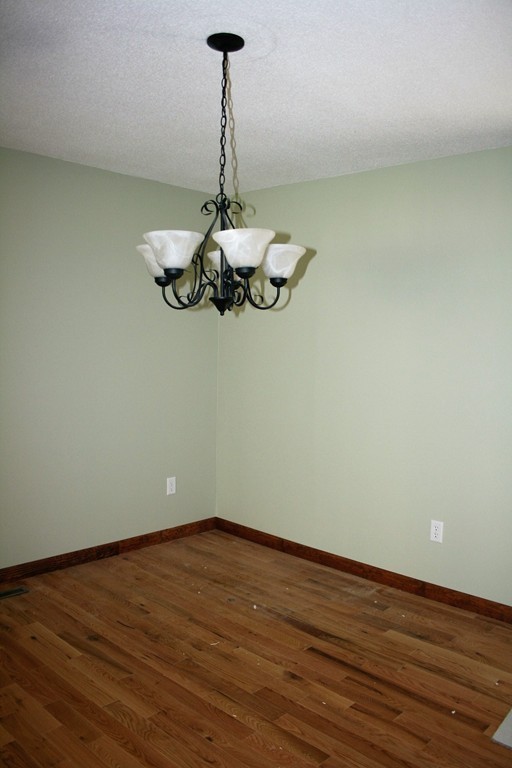 100 Signal Hill Circle Springfield, MA 01118 - Photo 6 of 19 a view of a room that has a chandelier