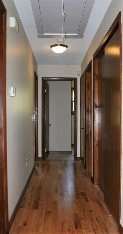 100 Signal Hill Circle Springfield, MA 01118 - Photo 10 of 19 a view of a livingroom with wooden floor