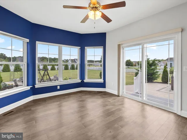 a view of a livingroom with a kitchen