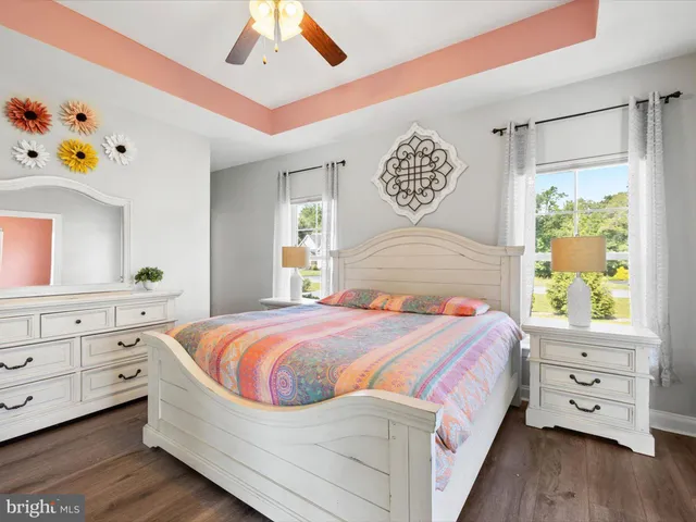 a bedroom with a bed and furniture