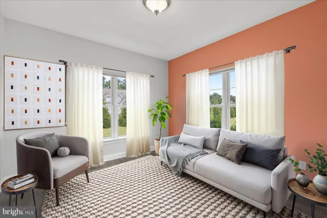 a kitchen with stainless steel appliances granite countertop wooden cabinets a stove a sink and a oven