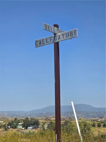 a view of a street with an ocean view