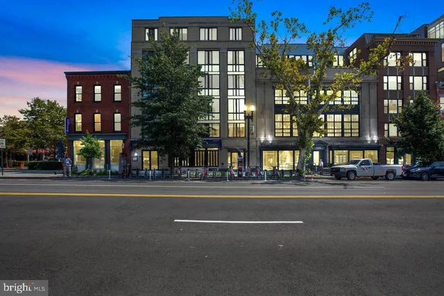 a view of a building with a street