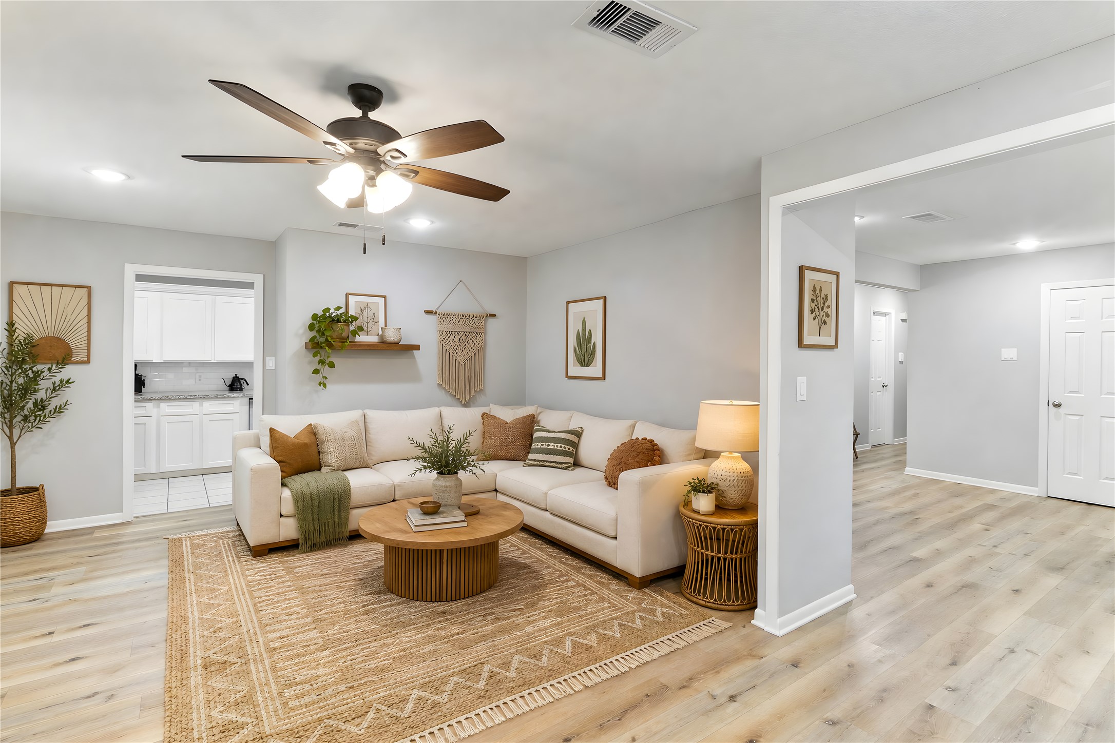 117 Cannon Street Clute, TX 77531 - Photo 11 of 24 Living room (14x19) with great natural lighting, an updated ceiling fan and open access to the dining area.