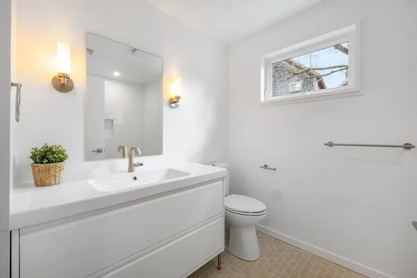 a bedroom with a bed and a closet