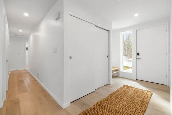 a view of a room with a large window