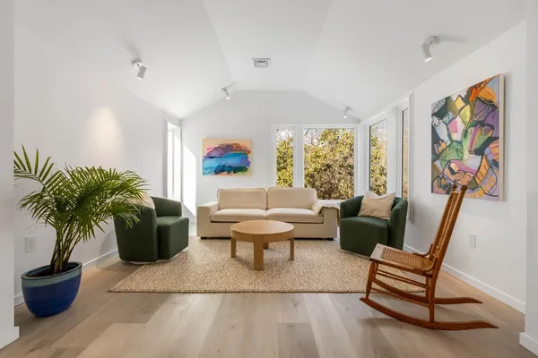 a living room with furniture and a table