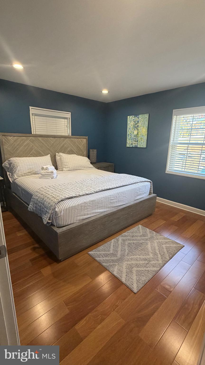 7306 Old Keene Mill Road Springfield, VA 22150 - Photo 16 of 21 a bedroom with a bed and a window