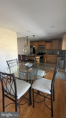 a view of a dining room with furniture