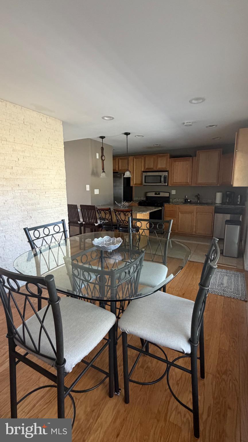 7306 Old Keene Mill Road Springfield, VA 22150 - Photo 6 of 21 a view of a dining room with furniture