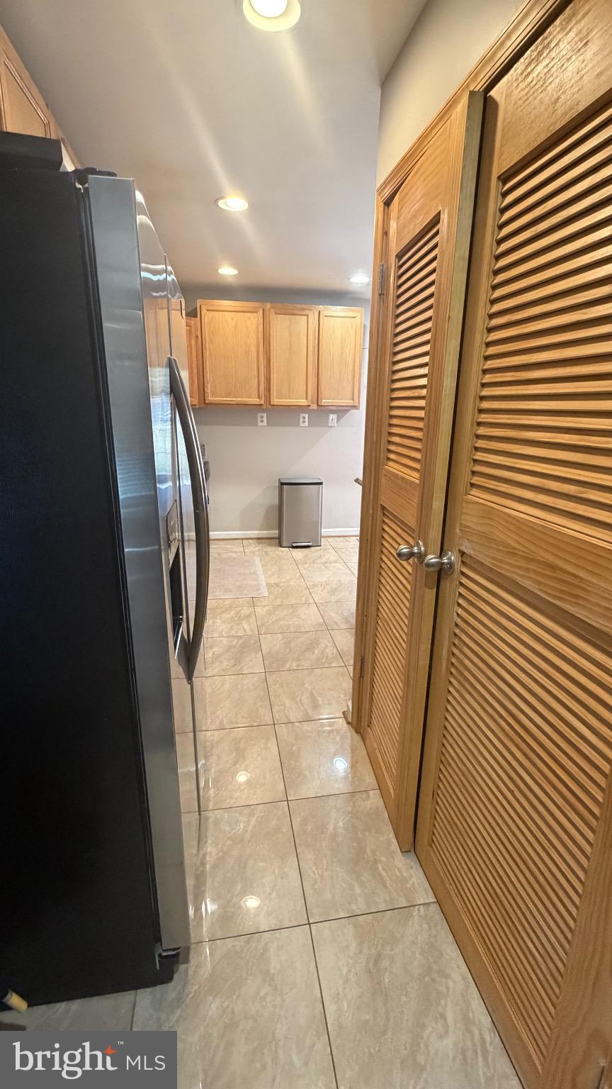 7306 Old Keene Mill Road Springfield, VA 22150 - Photo 7 of 21 a view of a hallway to a kitchen