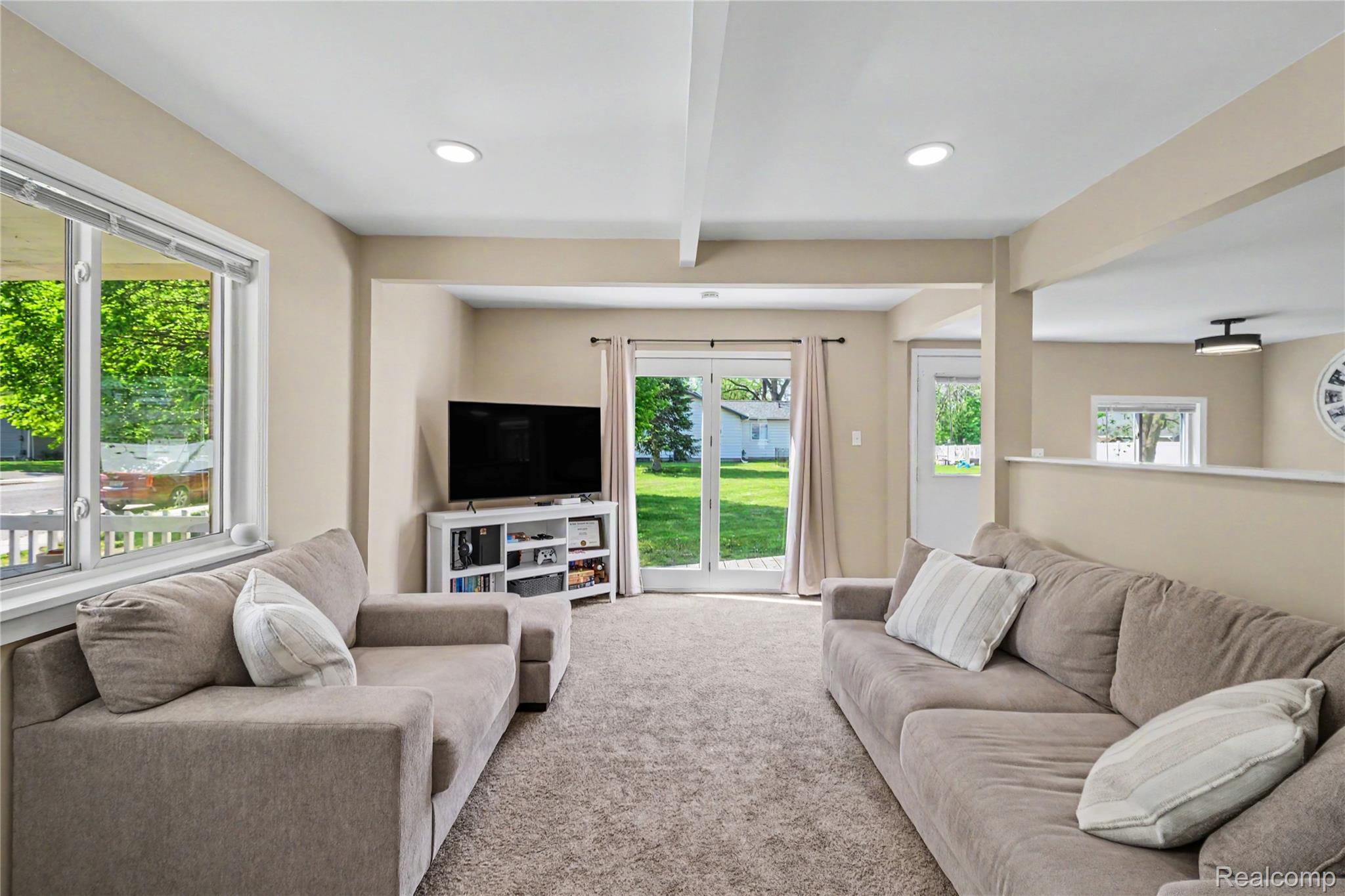 306 Mill Street Pinckney, MI 48169 - Photo 7 of 29 Open living space with lots of natural light