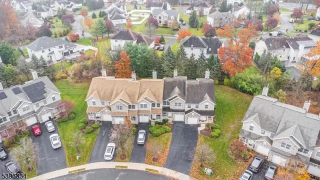 a view of swimming pool with seating area