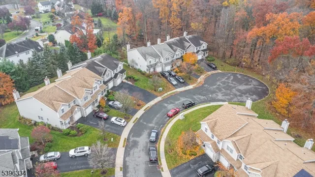 an aerial view of a swimming pool and outdoor space