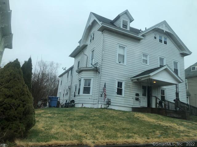26 Warren Street Norwich, CT 06360 - Photo 1 of 1 a view of a house with a yard