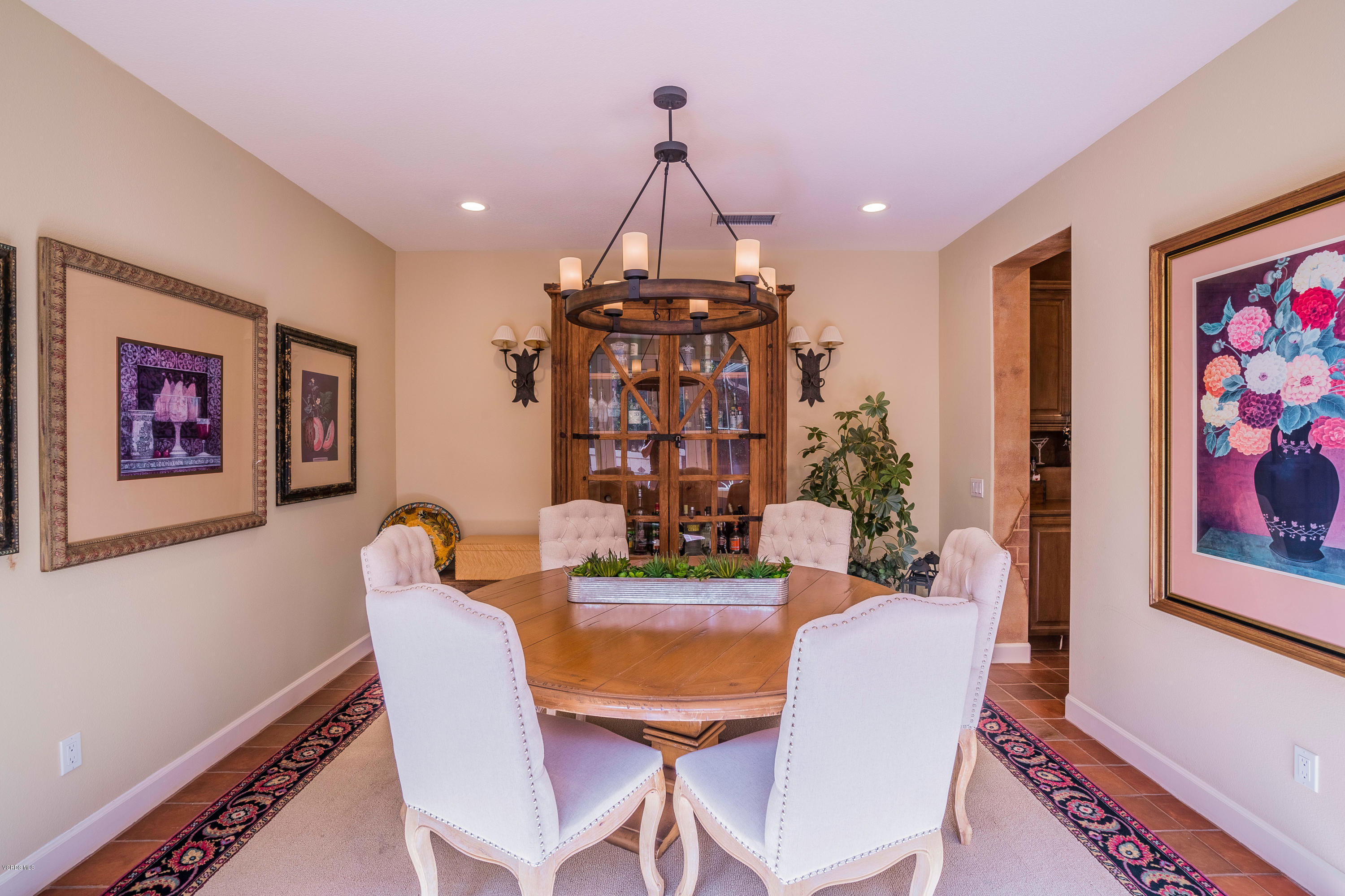 160 Laurel Ridge Drive Simi Valley, CA 93065 - Photo 8 of 45 a view of a dining room with furniture wooden floor and a chandelier