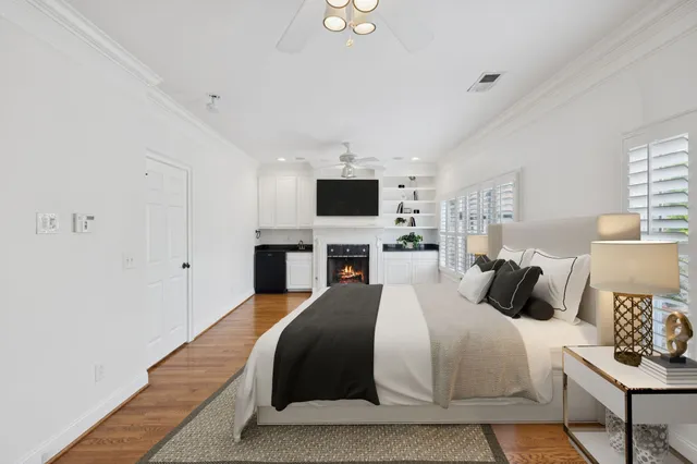 a bathroom with a bathtub and a window