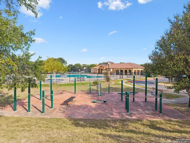 a house with swimming pool in front of it