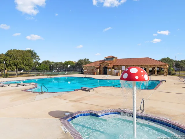 an aerial view of a swimming pool