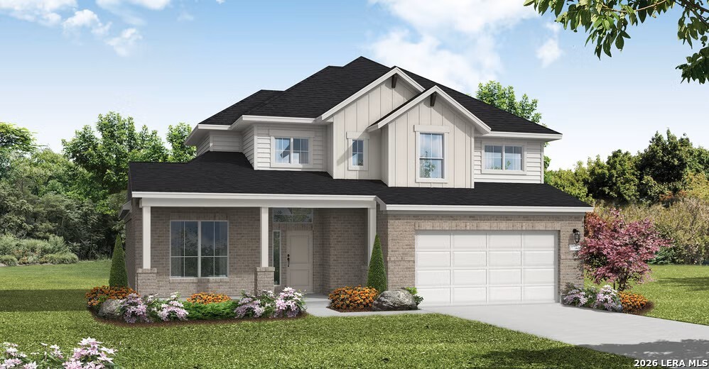 105 Chelson Rise Cibolo, TX 78108 - Photo 1 of 4 a front view of a house with a yard and garage
