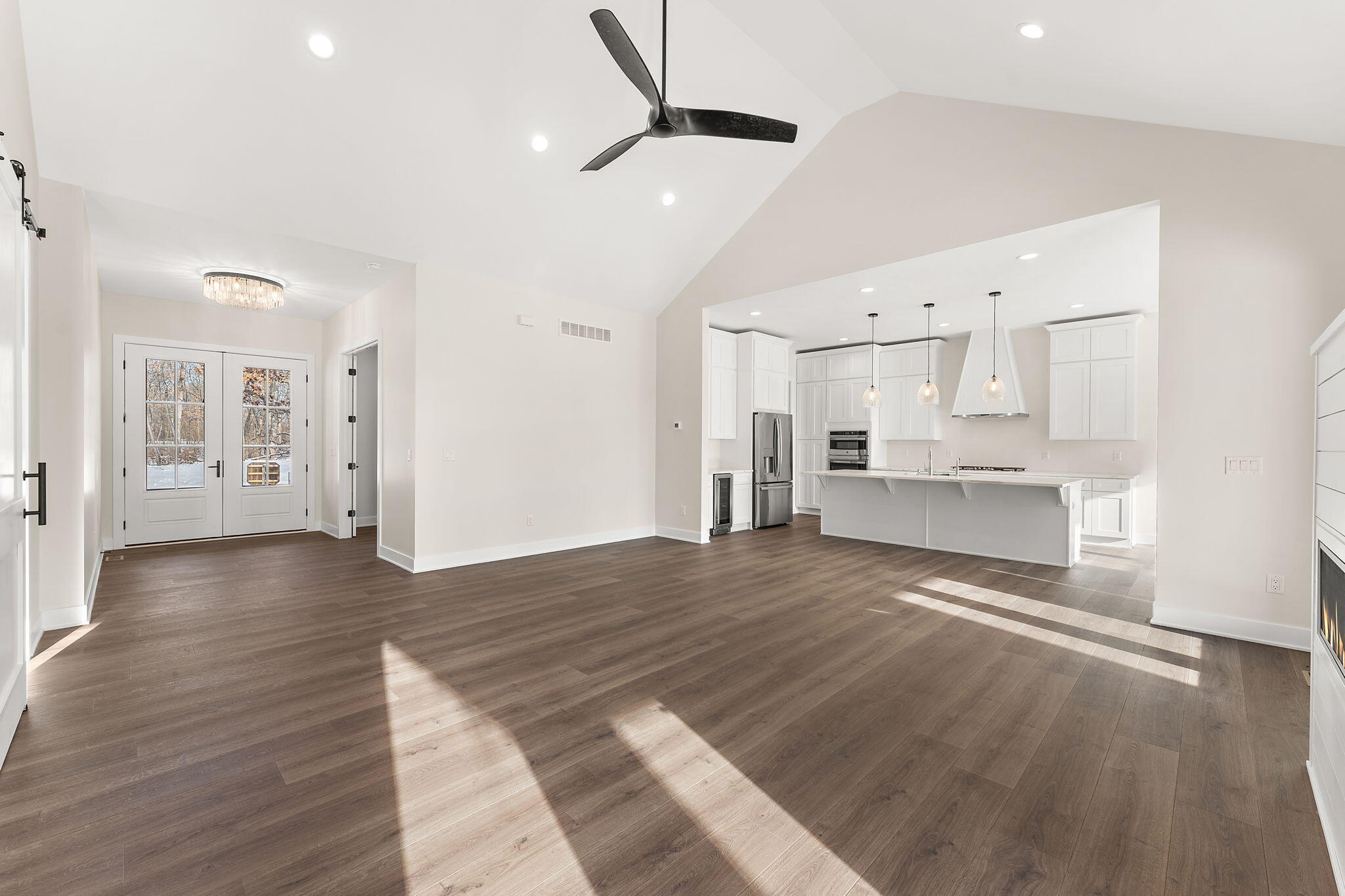 16669 Noble Street Lowell, IN 46356 - Photo 12 of 55 a view of a kitchen with wooden floor and a kitchen