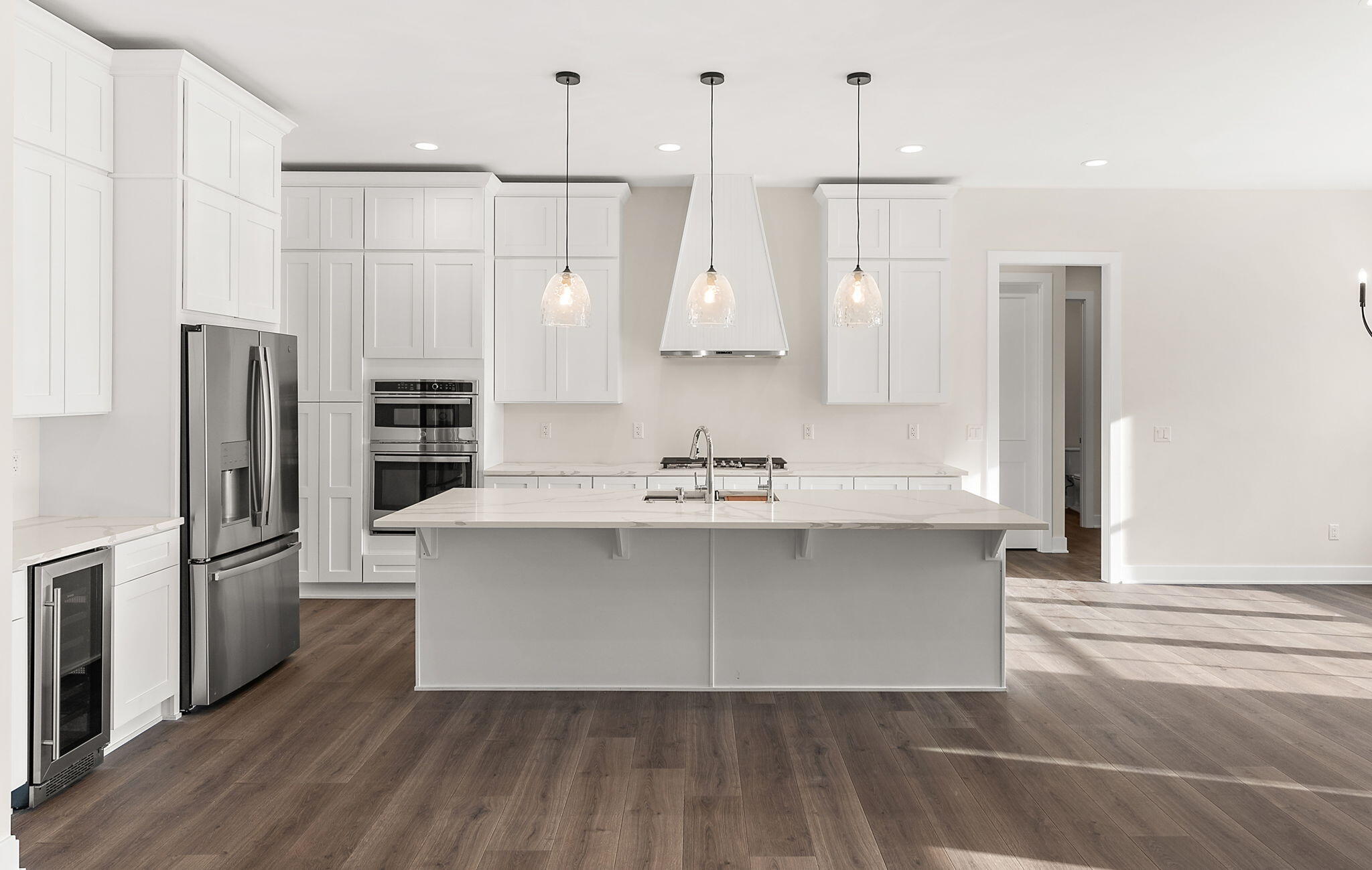 16669 Noble Street Lowell, IN 46356 - Photo 18 of 55 a kitchen with stainless steel appliances a refrigerator and a sink