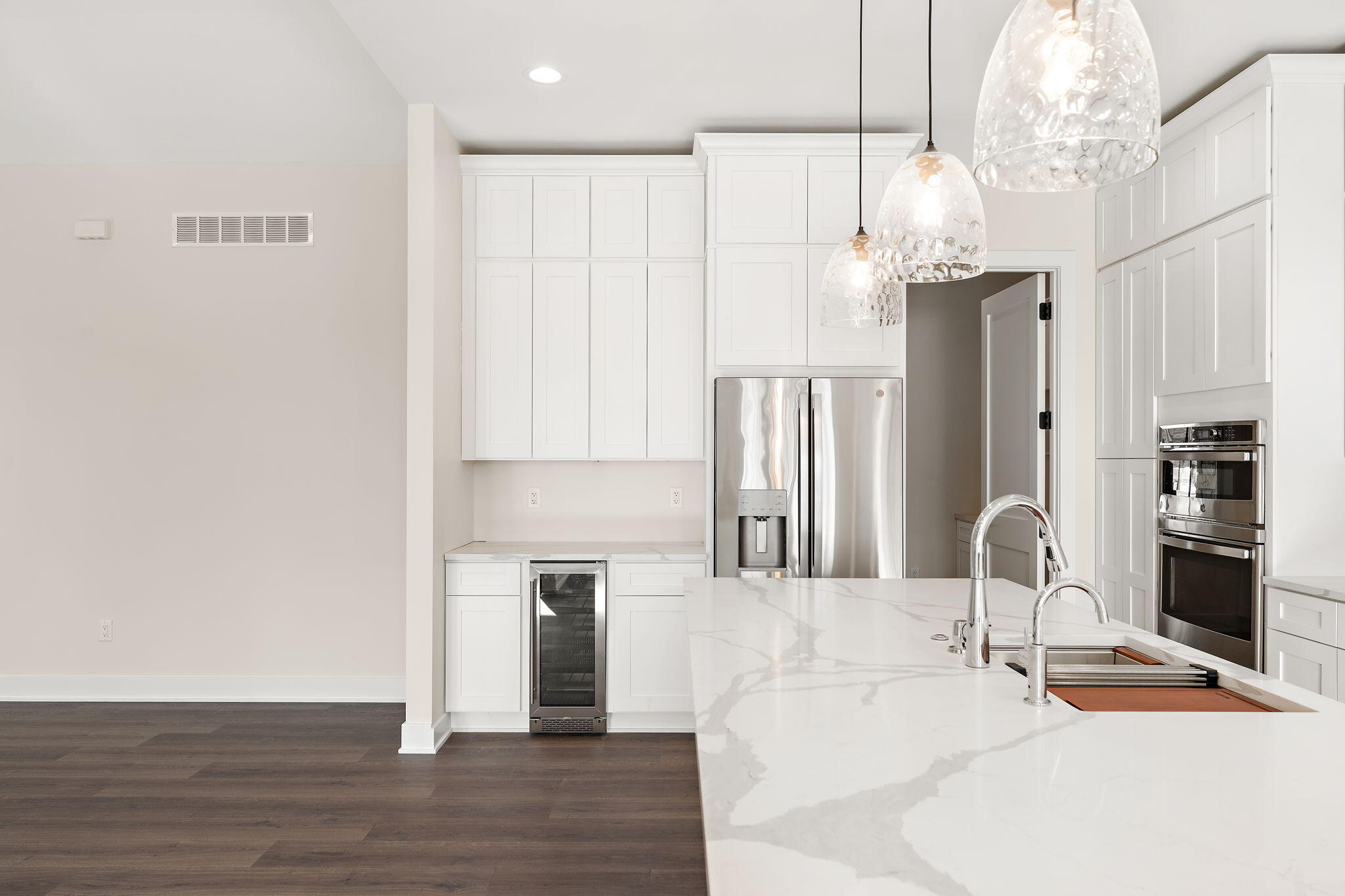 16669 Noble Street Lowell, IN 46356 - Photo 20 of 55 a kitchen with stainless steel appliances granite countertop a refrigerator and a sink