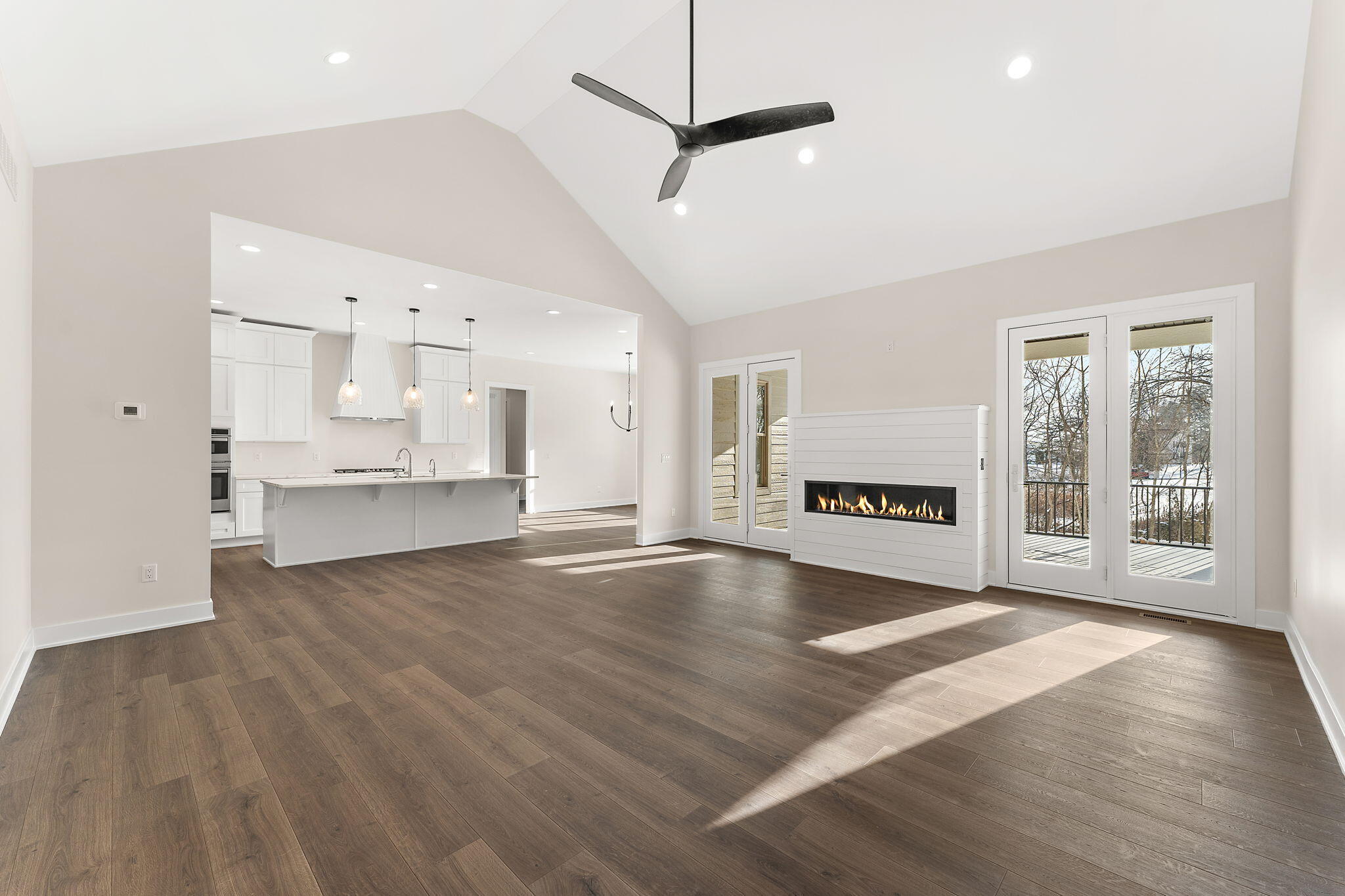 16669 Noble Street Lowell, IN 46356 - Photo 24 of 55 a view of an empty room with a window and wooden floor