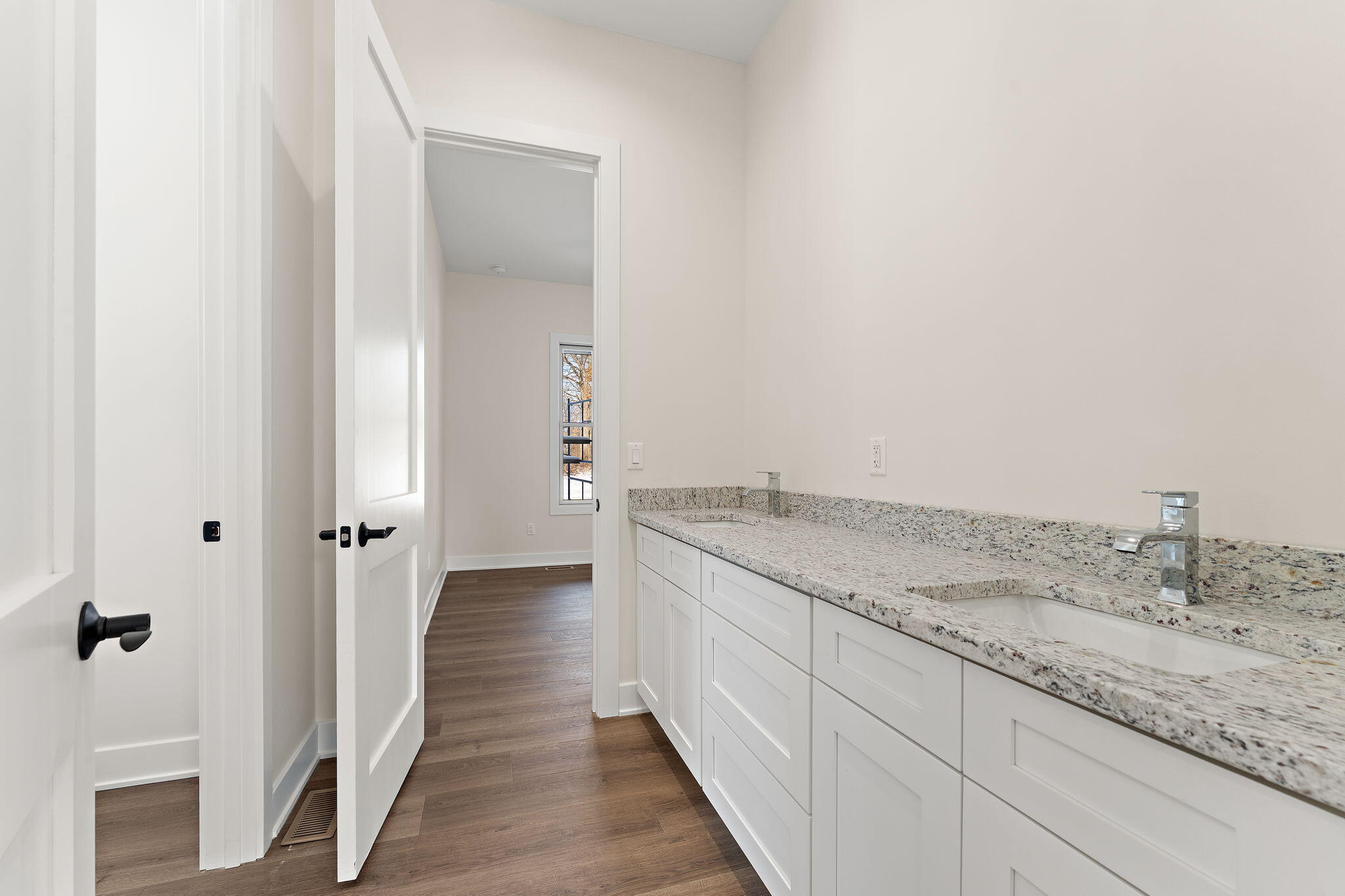 16669 Noble Street Lowell, IN 46356 - Photo 27 of 55 a bathroom with a granite countertop sink and a mirror
