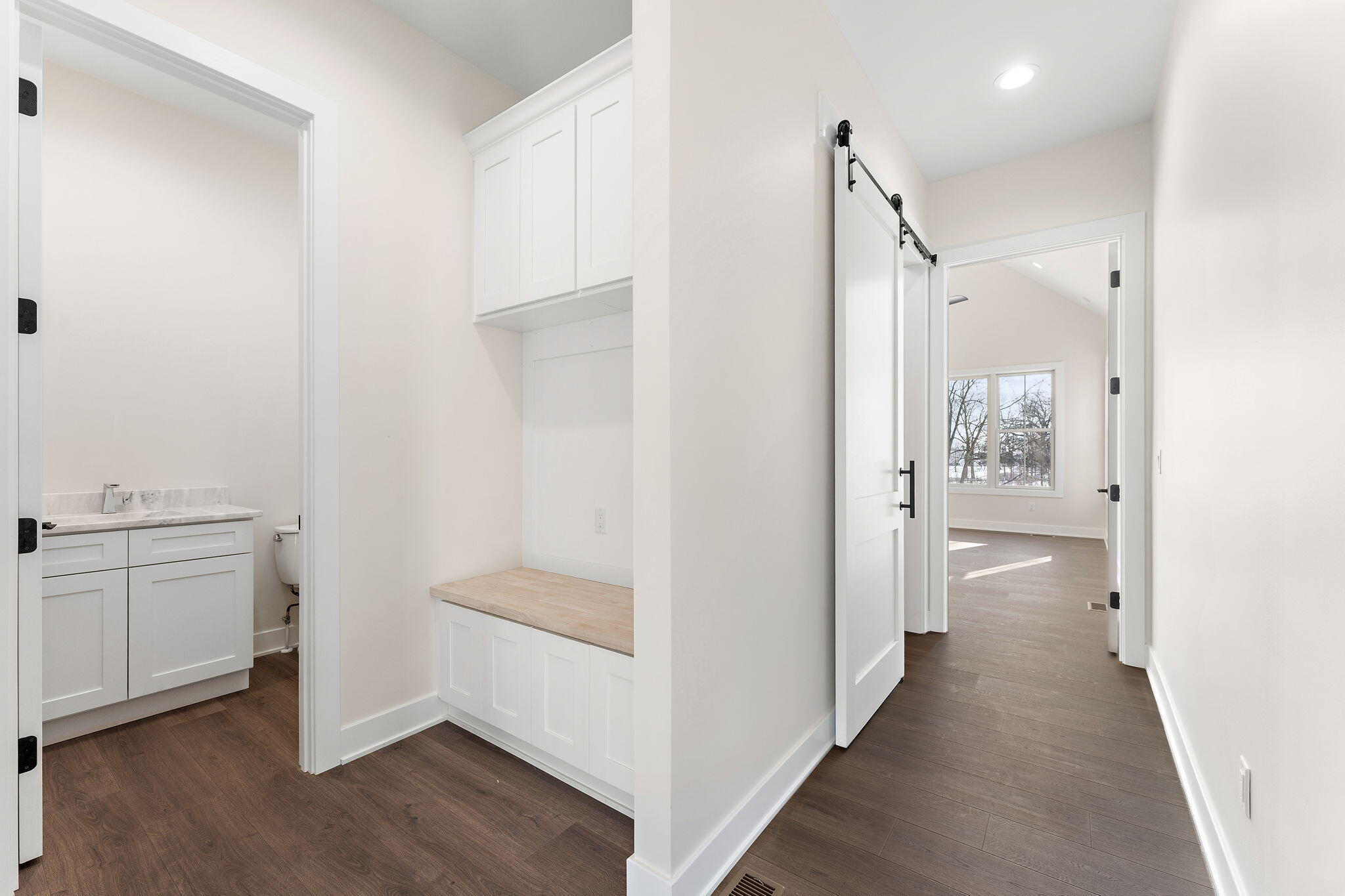 16669 Noble Street Lowell, IN 46356 - Photo 31 of 55 a view of a hallway with closet and wooden floor
